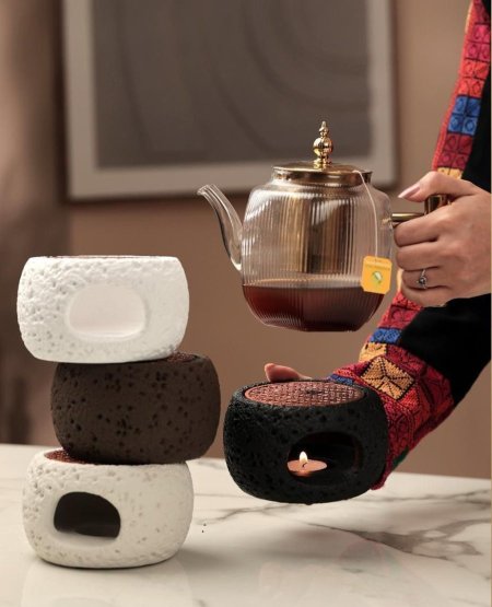 موقده   قاعدة تسخين حجري على الشمع